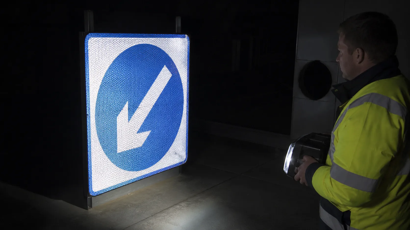Nighttime retroreflective check of a screen printed traffic sign.webp