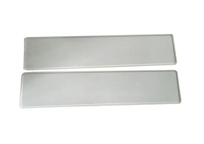 Aluminum-or-acrylic-sheets-are-cut-into-standard-plate-blanks